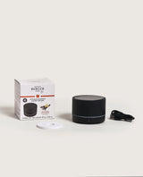 Black Maison Berger Nomad portable electric diffuser with Vanilla Gourmet fragrance refill, USB rechargeable cordless home fragrance diffuser with modern minimalist design.