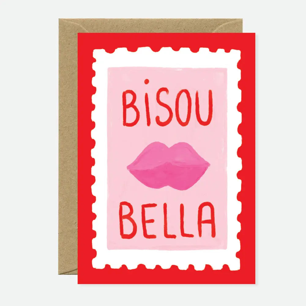 French-inspired Bisou Bella greeting card featuring pink lips and playful typography on premium cardstock with a blank interior and kraft envelope.