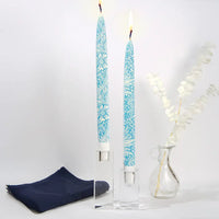 Set of two William Morris Blue Marigold decorative taper candles featuring blue botanical floral artwork and handcrafted flat candle design.