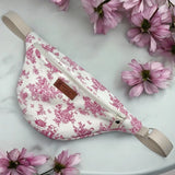 French pink toile cotton belt bag and fanny pack with adjustable strap, handmade in France with romantic Marie Antoinette-inspired floral print.