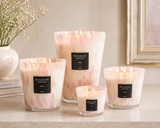 Baobab Collection White Pearls luxury scented candle in pearlized hand-blown glass vessel with floral orchid, freesia, and white musk fragrance.