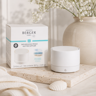 White Maison Berger Nomad portable electric diffuser with Ocean Breeze fragrance refill, USB rechargeable cordless home fragrance diffuser with minimalist modern design.