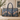 William Morris Strawberry Thief blue tapestry duffel bag with birds and floral pattern, navy faux leather handles, and spacious weekender holdall design for travel and overnight trips.