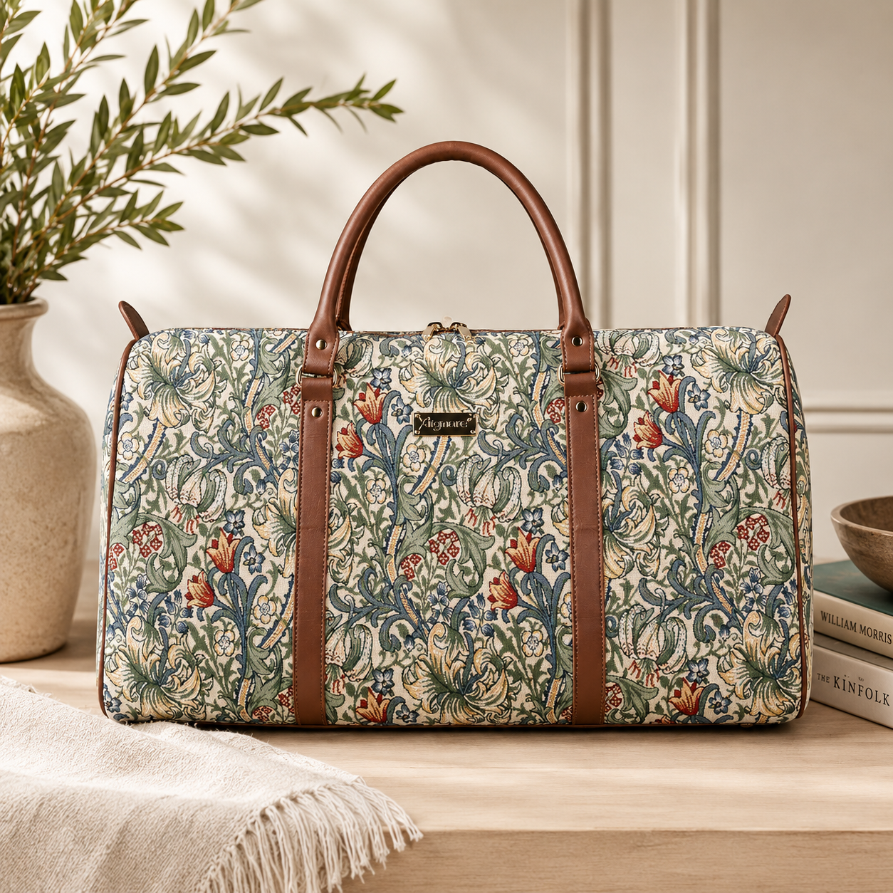 William Morris Golden Lily tapestry duffel bag with botanical floral pattern and faux leather handles