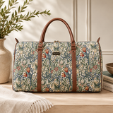 William Morris Golden Lily tapestry duffel bag with botanical floral pattern and faux leather handles