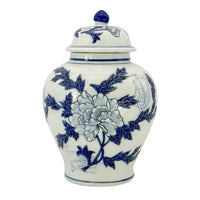 Blue and white floral chinoiserie ceramic ginger jar with lid, featuring classic botanical detailing and traditional decorative styling